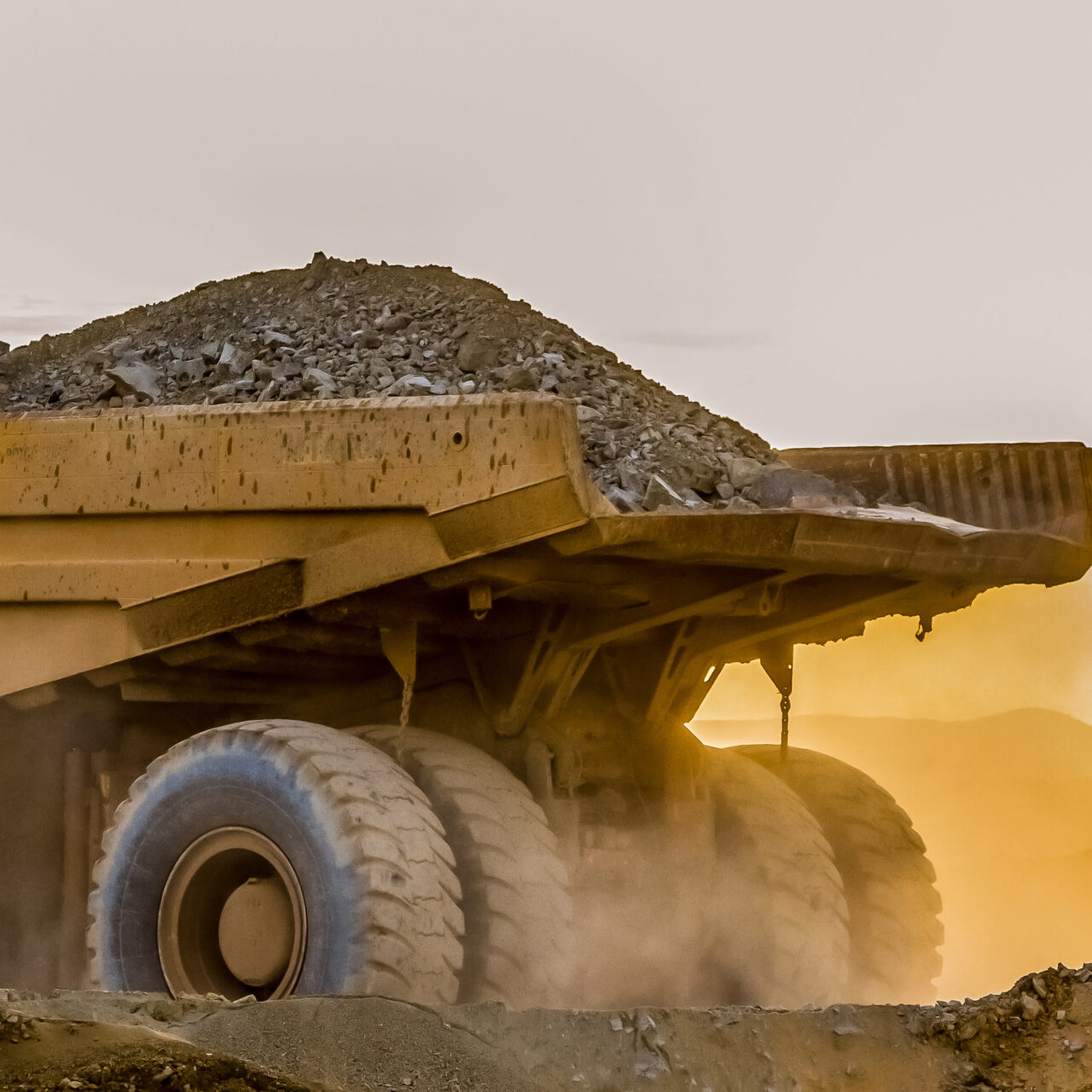 A large truck carrying sand on a platinum mining site in Africa