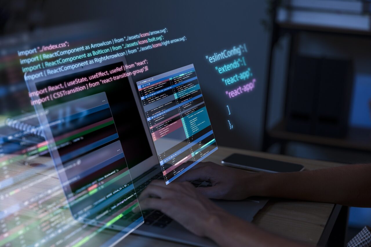 https://ibwuniversity.com/wp-content/uploads/2025/06/programming-background-with-person-working-with-codes-computer-1280x853.jpg